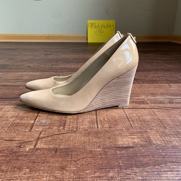 Stuart Weitzman tan pointed toe wedge heel pumps